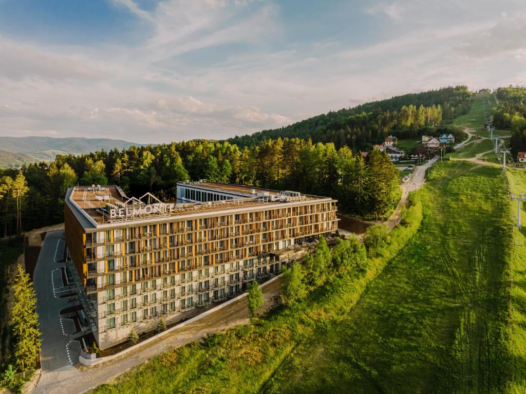 an aerial view of a hotel in the mountains at BELMONTE Hotel Krynica-Zdrój in Krynica Zdrój