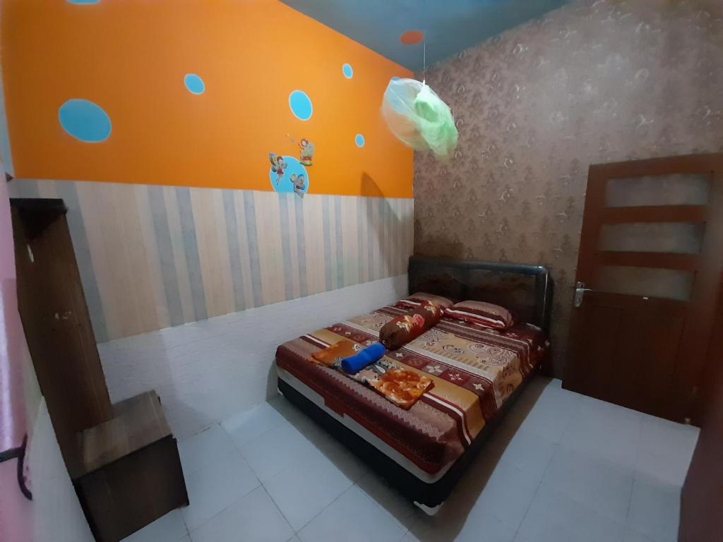 Postel nebo postele na pokoji v ubytování Mocca Guest House