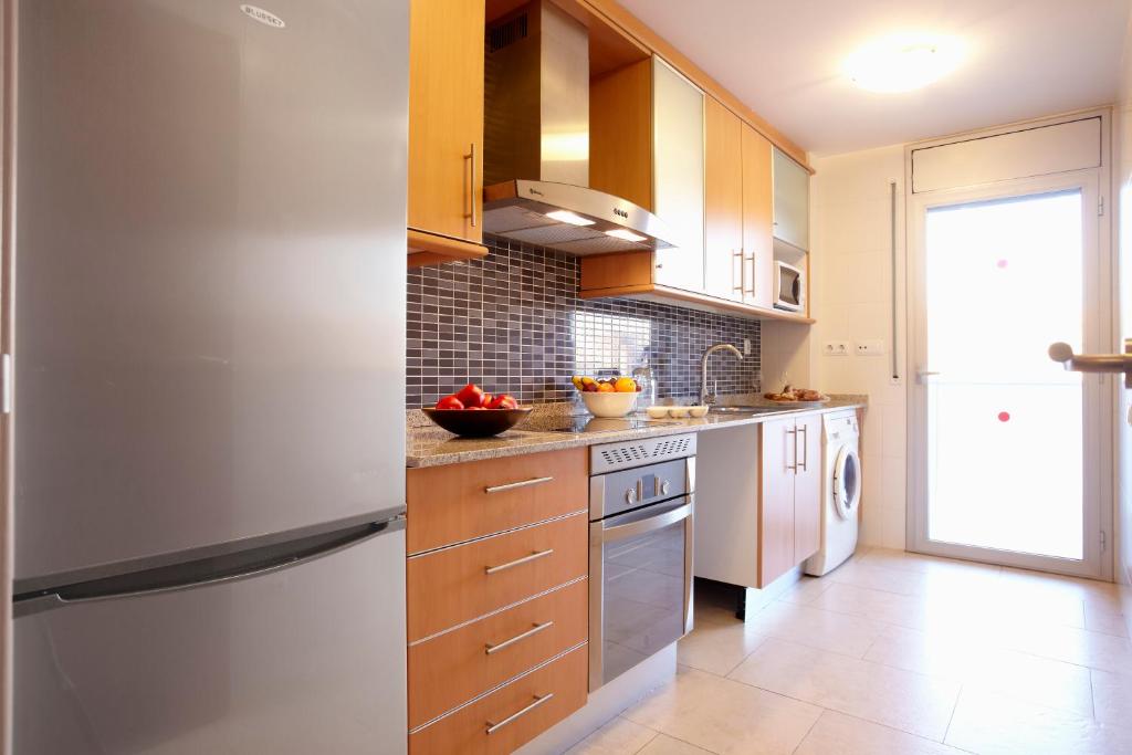 Kuchyň nebo kuchyňský kout v ubytování IBERSOL SPA AQQUARIA SUITES