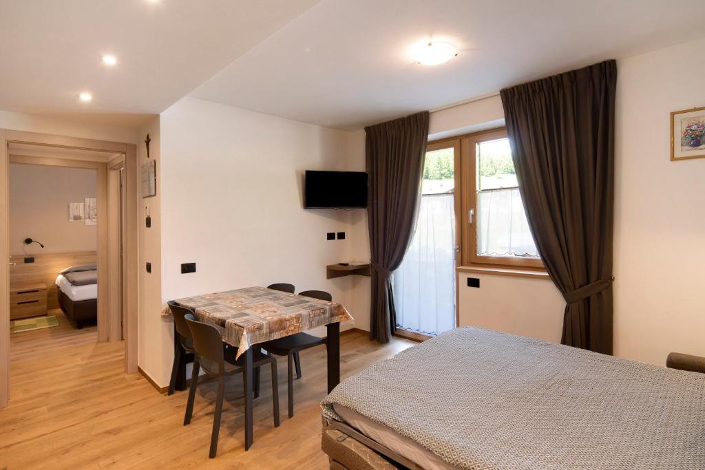 A bed or beds in a room at Appartamento Federia Casa Campacc