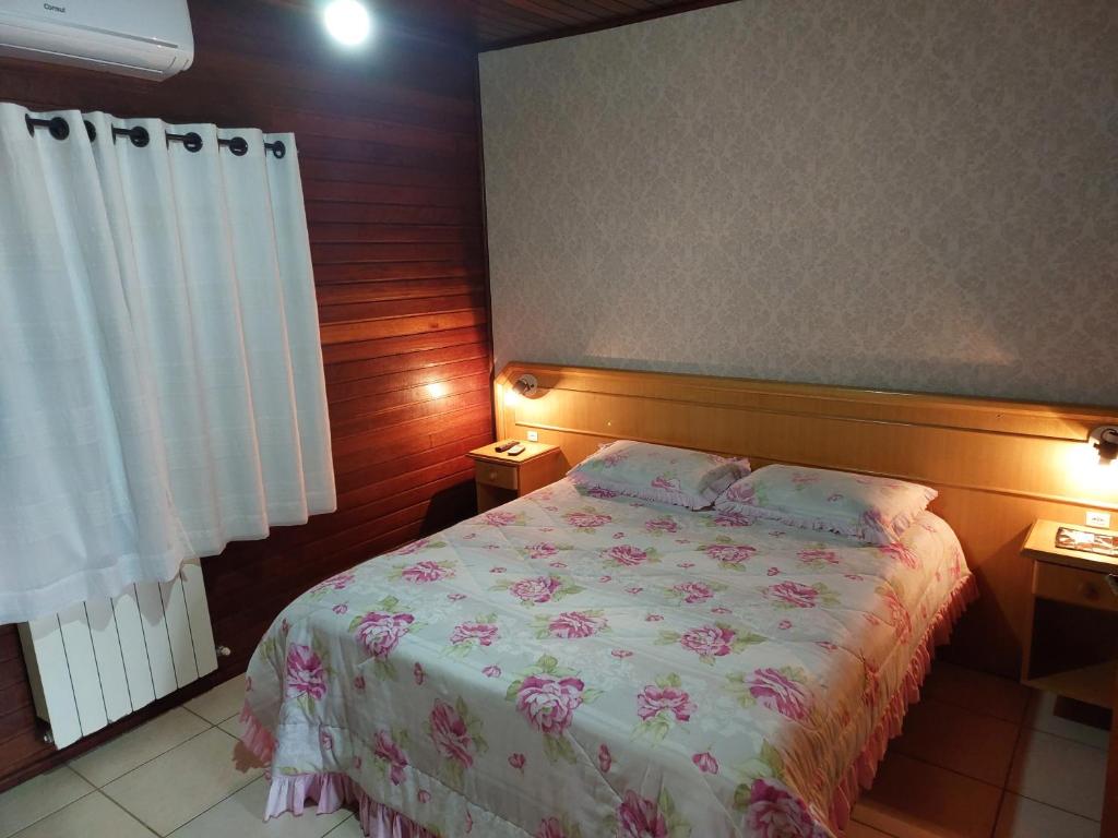 Katil atau katil-katil dalam bilik di Pousada Villa Fiorita