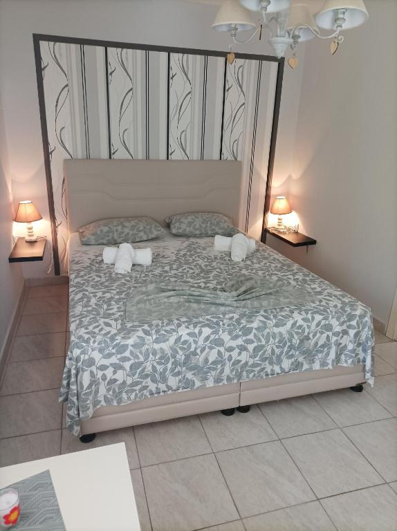 Postel nebo postele na pokoji v ubytování Dimitra Apartments