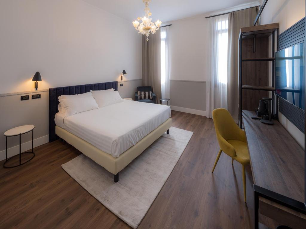 Postel nebo postele na pokoji v ubytování The Foscarini
