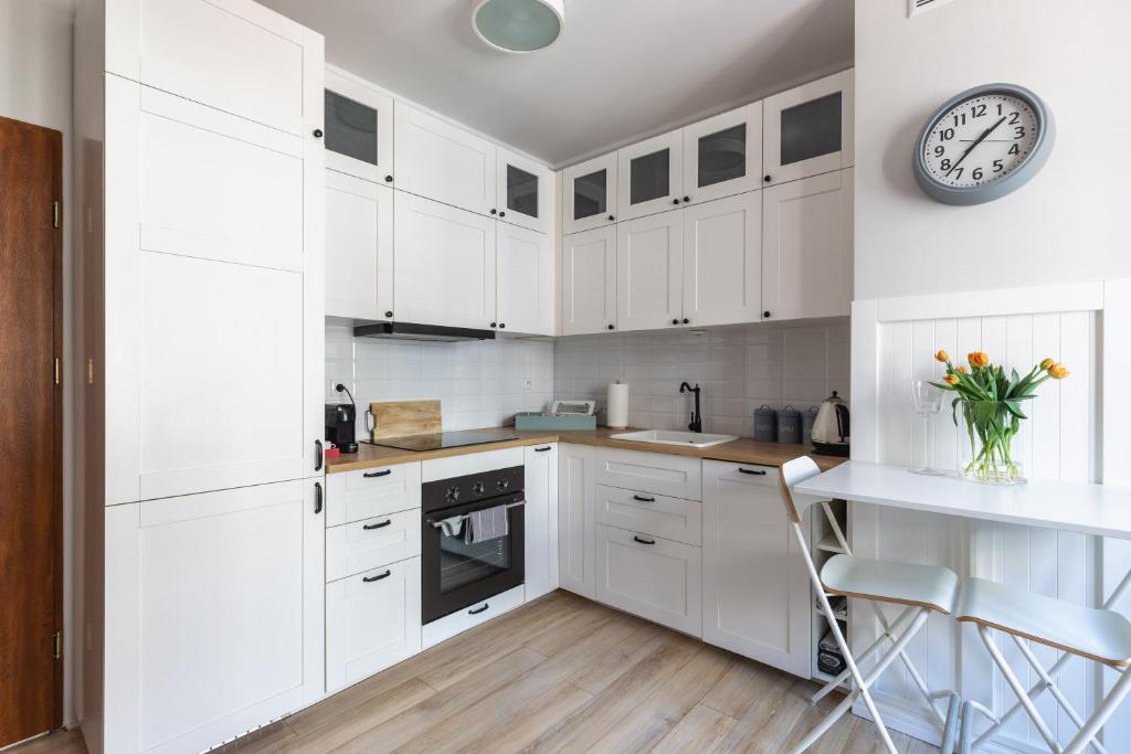 Kuchyňa alebo kuchynka v ubytovaní Apartament Wigilijna Starówka
