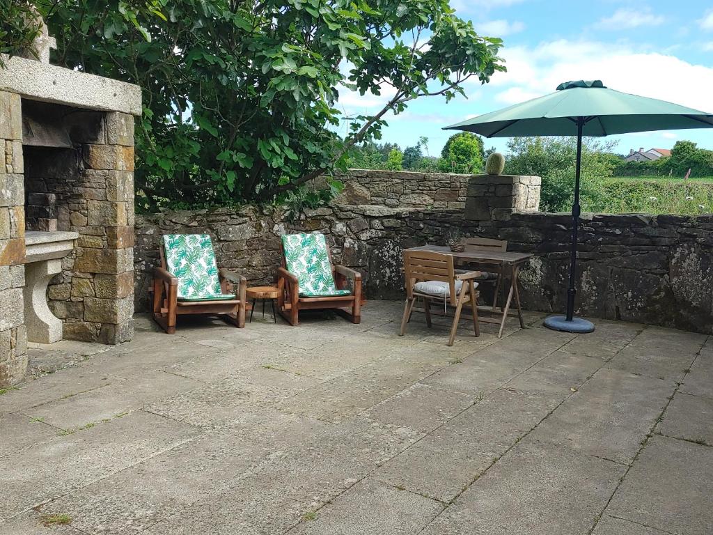 Patio alebo iná vonkajšia časť ubytovania Casita vacacional 5 rutas en el rural Costa Da Morte