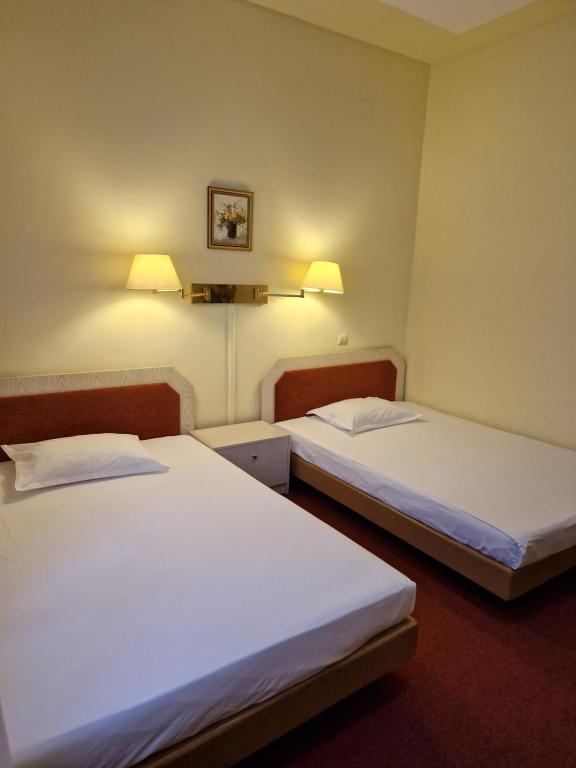 Postel nebo postele na pokoji v ubytování Casa Palace