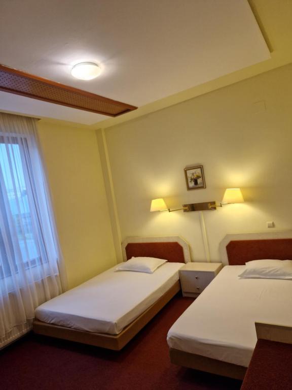 Postel nebo postele na pokoji v ubytování Casa Palace
