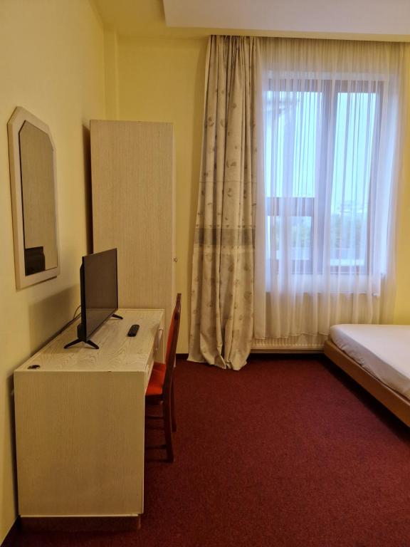 Postel nebo postele na pokoji v ubytování Casa Palace