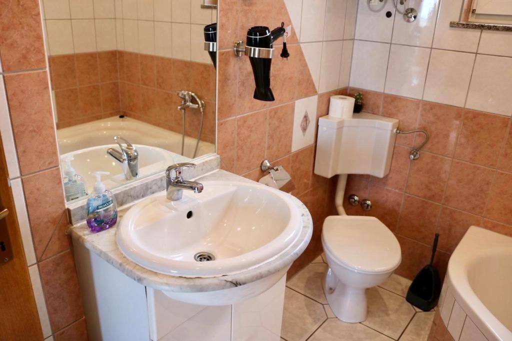 Koupelna v ubytování Apartmani Janja
