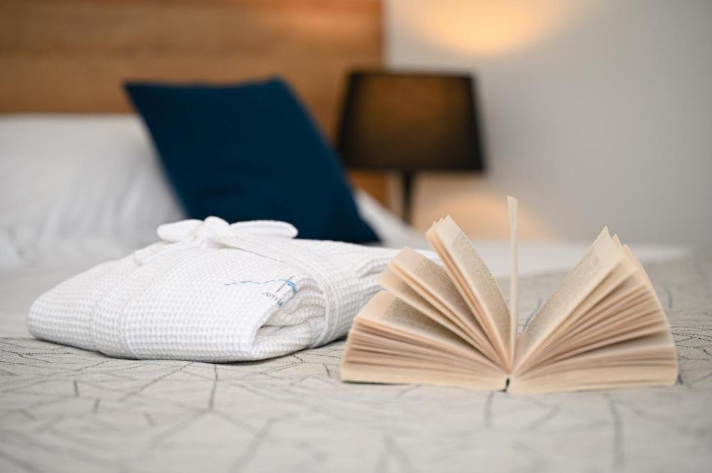 Posteľ alebo postele v izbe v ubytovaní Casa Laurea