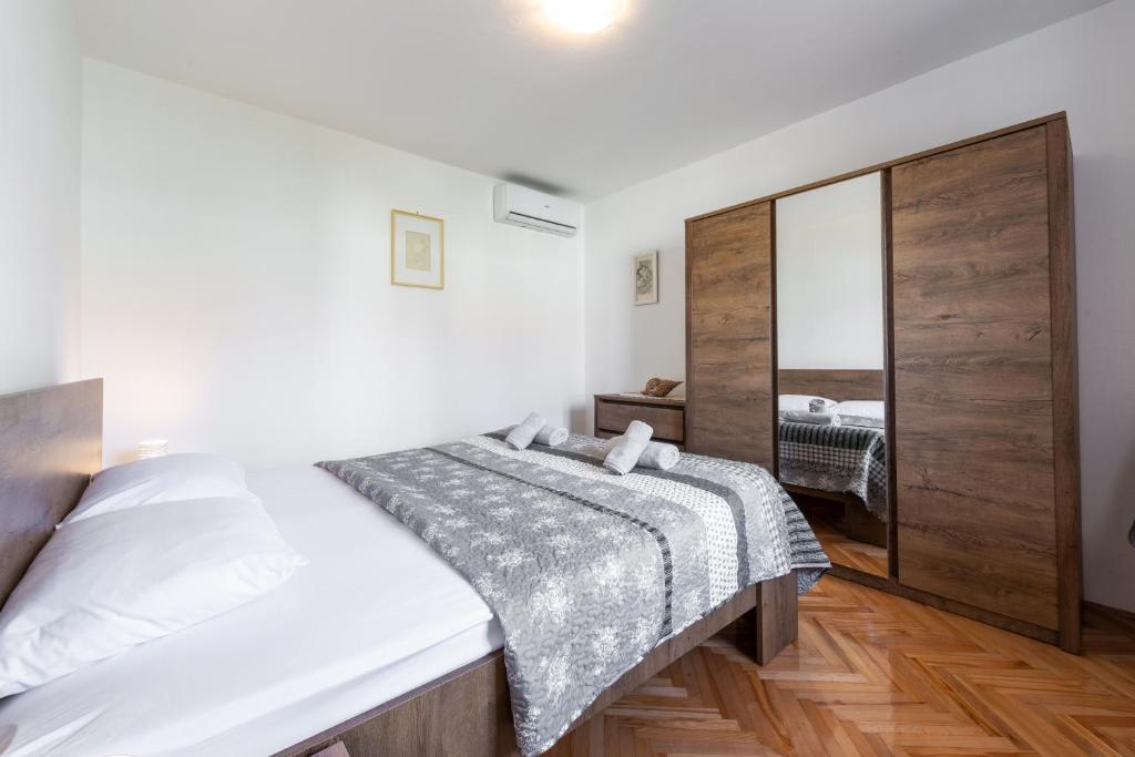 Posteľ alebo postele v izbe v ubytovaní Sea Shell Apartments