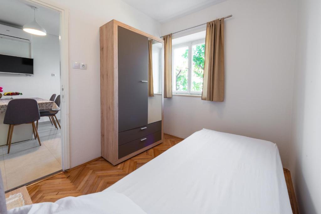 Posteľ alebo postele v izbe v ubytovaní Sea Shell Apartments