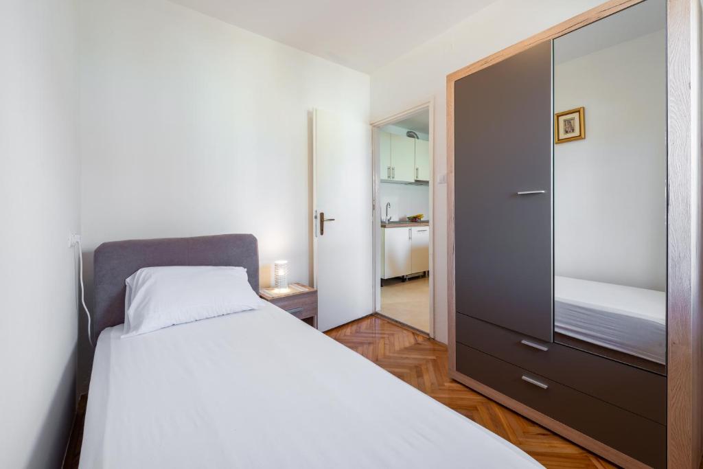Posteľ alebo postele v izbe v ubytovaní Sea Shell Apartments