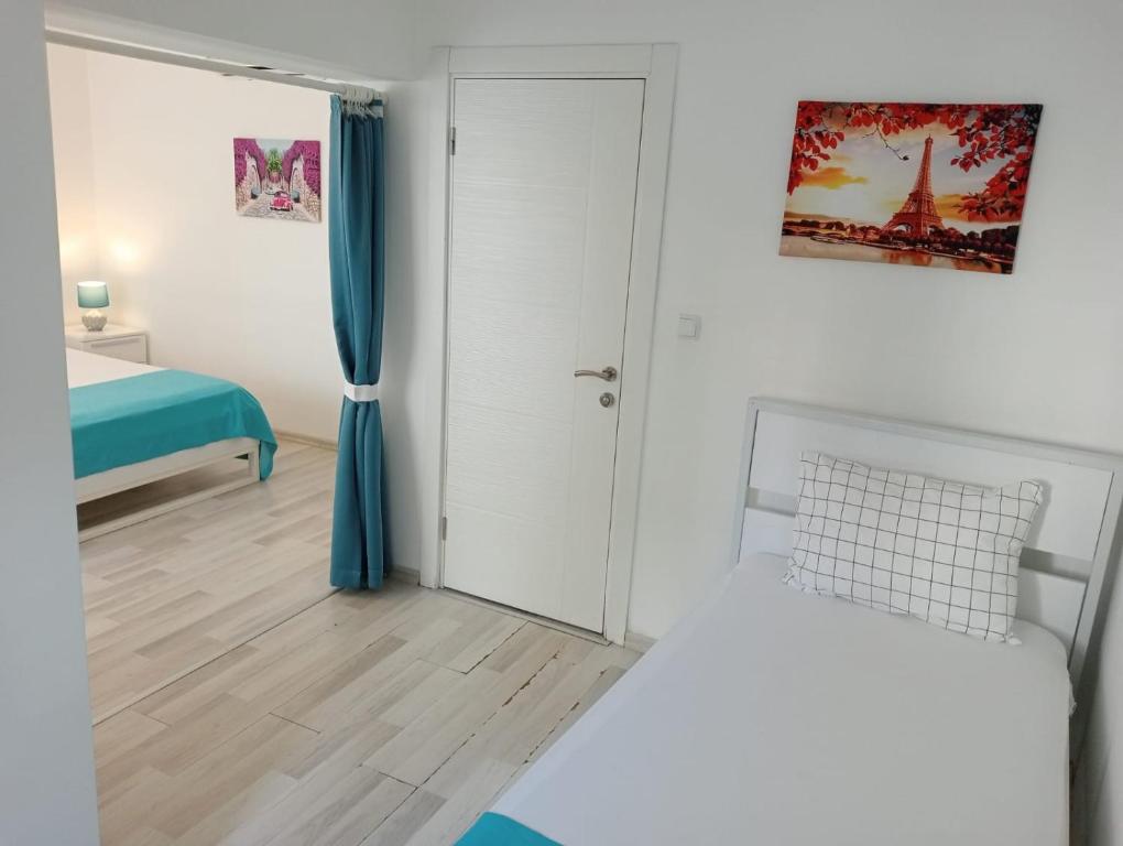 Postel nebo postele na pokoji v ubytování Daffne Otel
