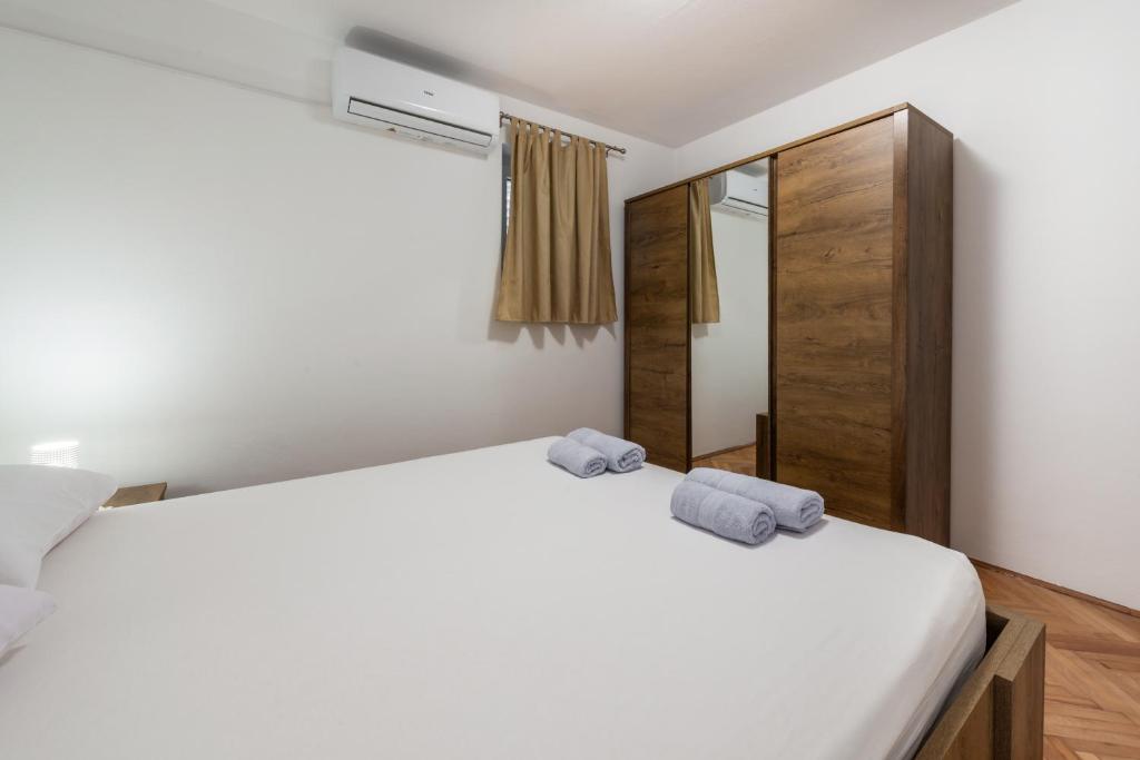 Posteľ alebo postele v izbe v ubytovaní Sea Shell Apartments