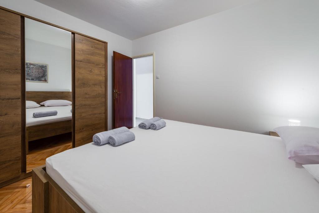 Posteľ alebo postele v izbe v ubytovaní Sea Shell Apartments