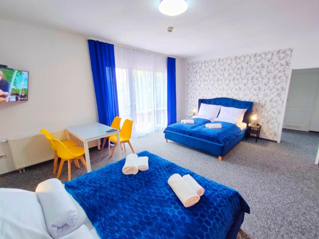 Postel nebo postele na pokoji v ubytování Great Polonia Sand Beach Mielno
