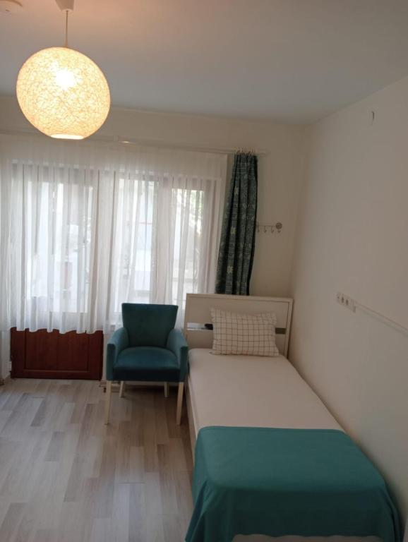 Postel nebo postele na pokoji v ubytování Daffne Otel
