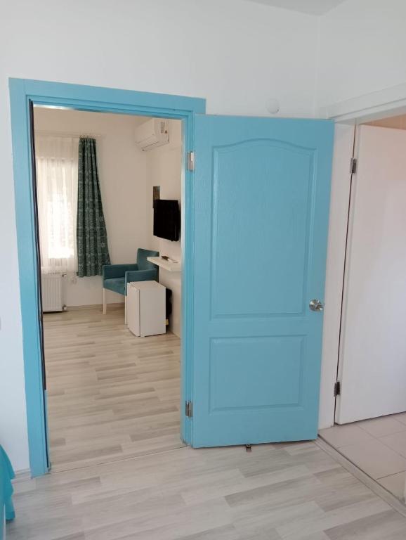 TV a/nebo společenská místnost v ubytování Daffne Otel