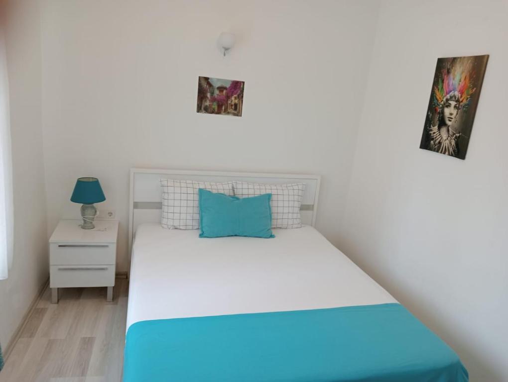 Postel nebo postele na pokoji v ubytování Daffne Otel