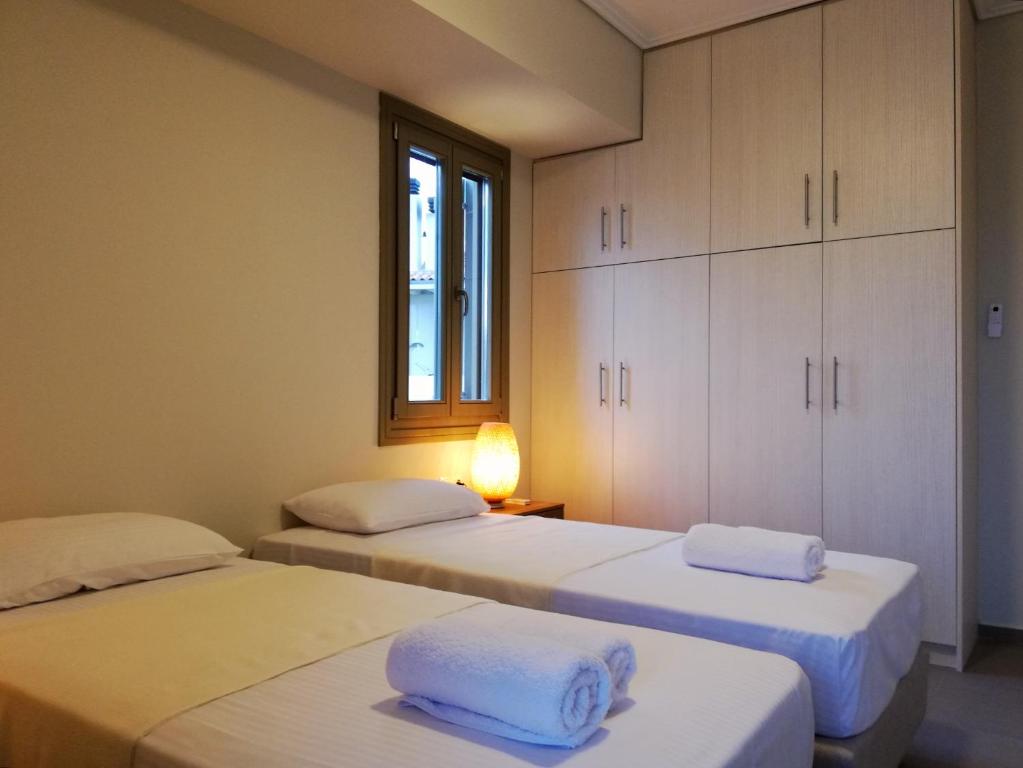 A bed or beds in a room at Nautilus Beach Home