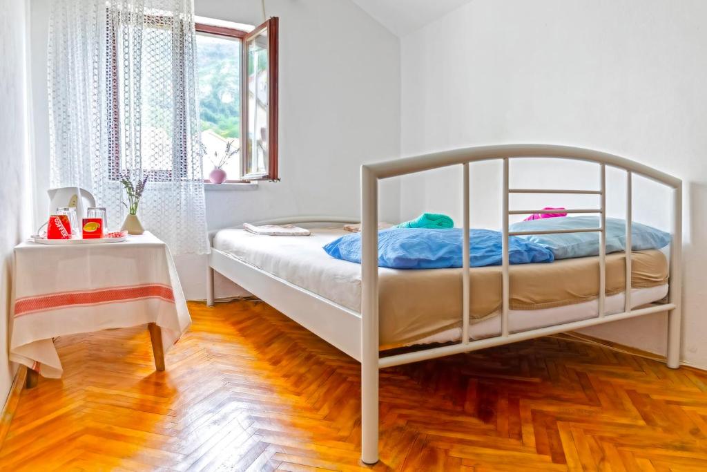 Postel nebo postele na pokoji v ubytování Private rooms - Tivat