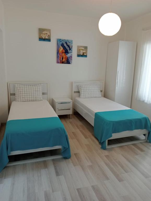 Postel nebo postele na pokoji v ubytování Daffne Otel