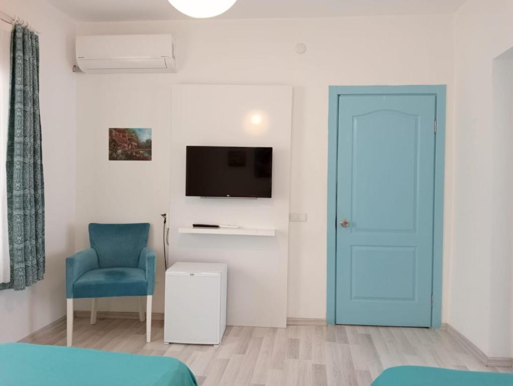 TV a/nebo společenská místnost v ubytování Daffne Otel