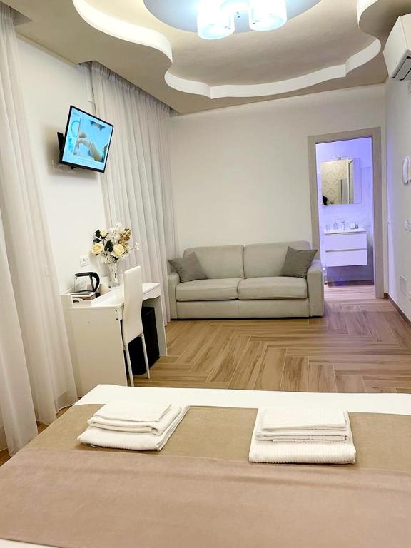 TV a/nebo společenská místnost v ubytování Affittacamere ELVI 2