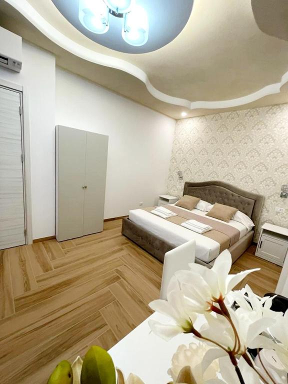 Postel nebo postele na pokoji v ubytování Affittacamere ELVI 2