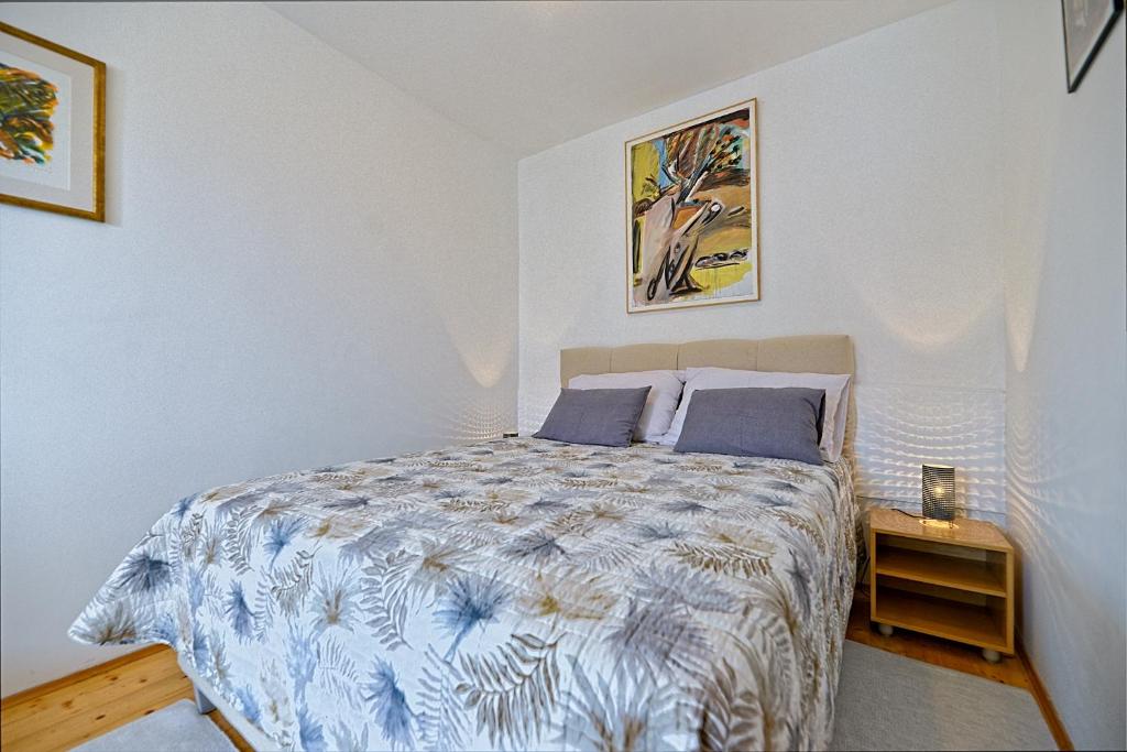 Posteľ alebo postele v izbe v ubytovaní Art Apartments Postira