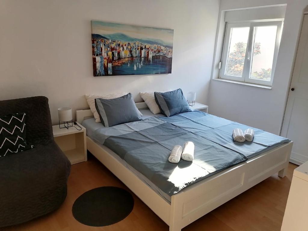 Posteľ alebo postele v izbe v ubytovaní Studio Punta Pakoštane