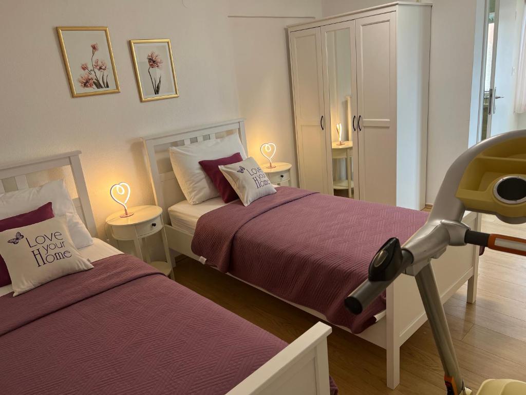 Postel nebo postele na pokoji v ubytování Villa HOPE