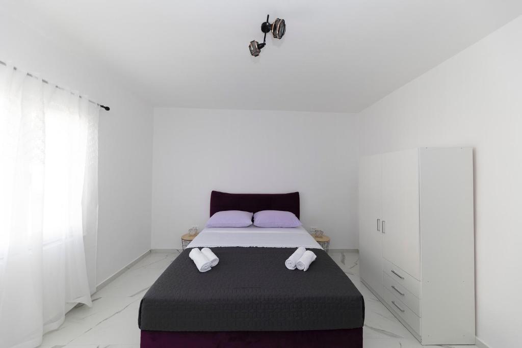 Krevet ili kreveti u jedinici u okviru objekta Sunrise, beautiful penthouse with jacuzzi