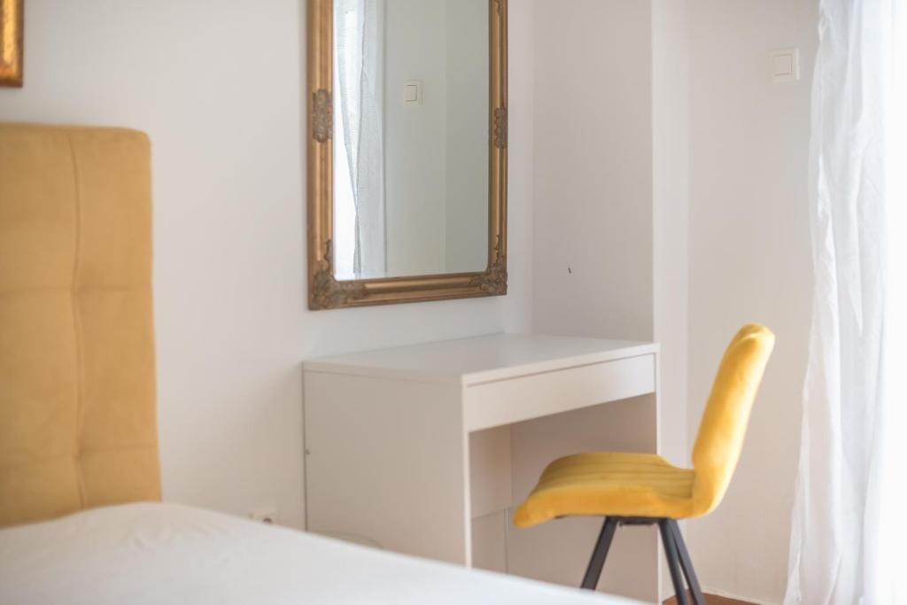 Łóżko lub łóżka w pokoju w obiekcie Victoria Secret Apartments