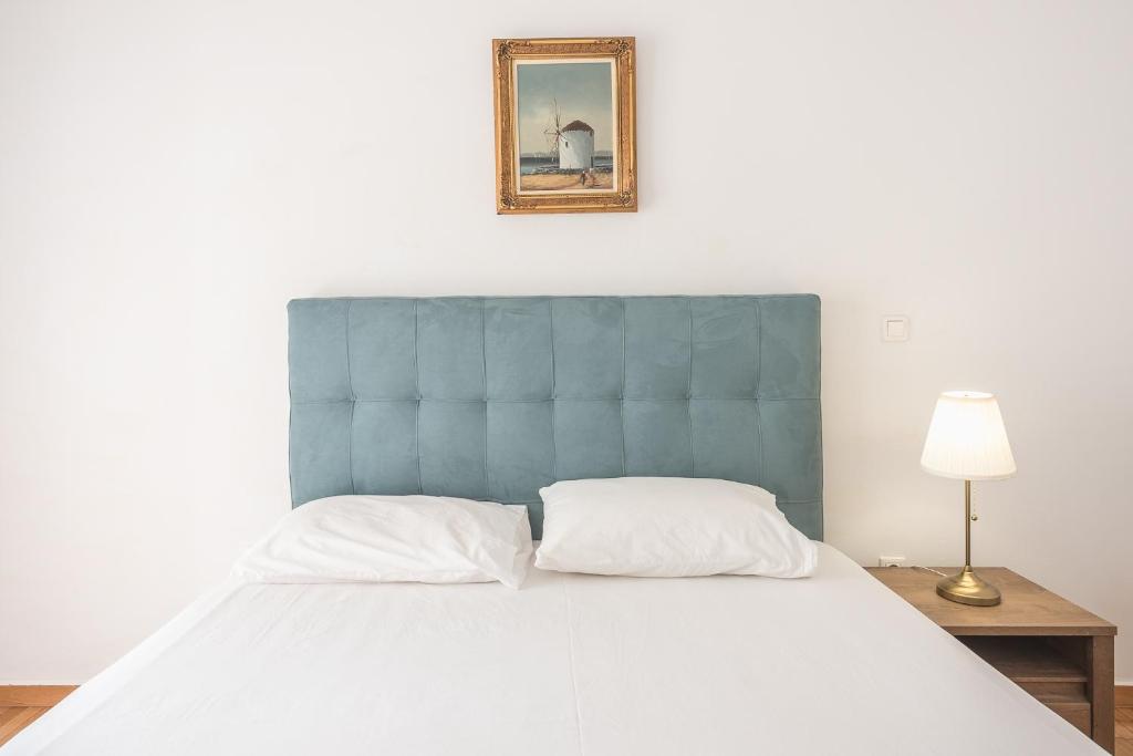 Łóżko lub łóżka w pokoju w obiekcie Victoria Secret Apartments