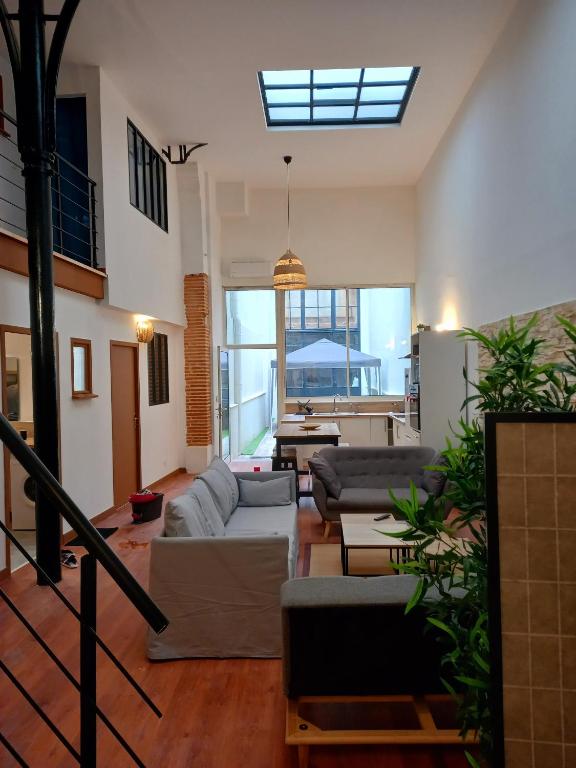 Posezení v ubytování T5 L'ATELIER