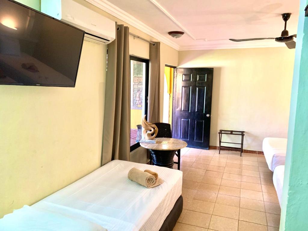 Postel nebo postele na pokoji v ubytování Hotel Green River