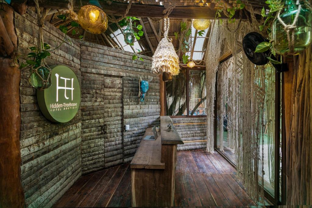 Area soggiorno di Hidden Treehouse Tulum Eco-Hotel