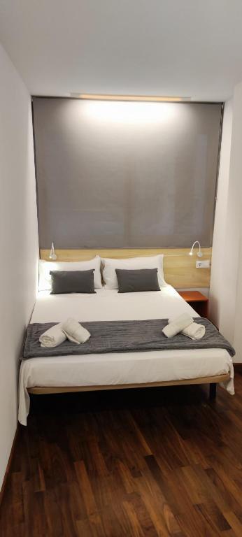 Posteľ alebo postele v izbe v ubytovaní Baron Suites