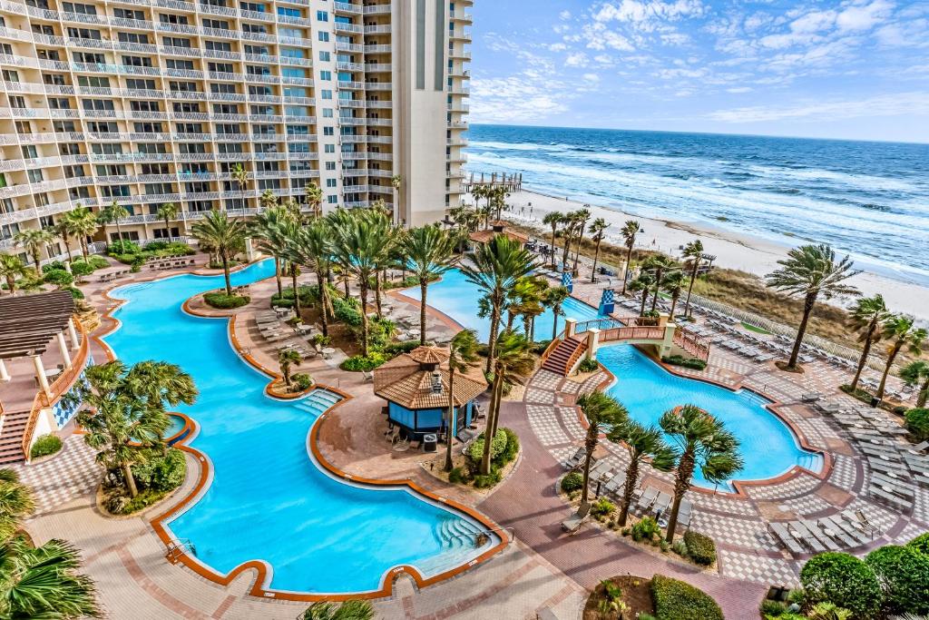 an aerial view of the pool at the resort with the beach at Shores of Panama 1517 in Panama City Beach