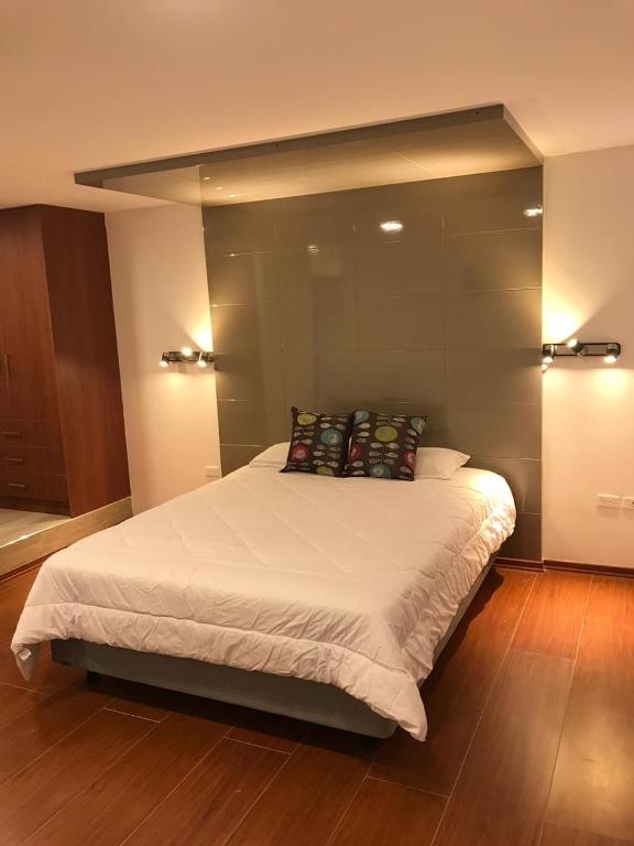 Postel nebo postele na pokoji v ubytování Hotel Bacastell