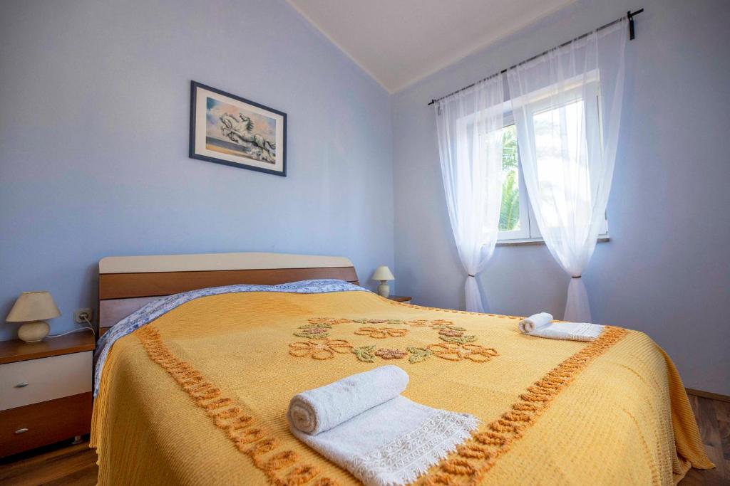 Postel nebo postele na pokoji v ubytování Apartment David