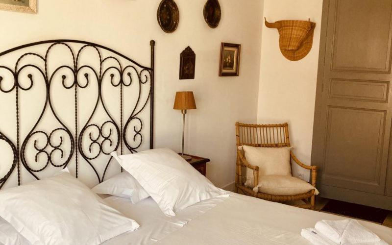 Postel nebo postele na pokoji v ubytování Hôtel Lido Beach