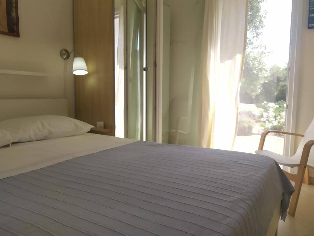 Postel nebo postele na pokoji v ubytování Ambra
