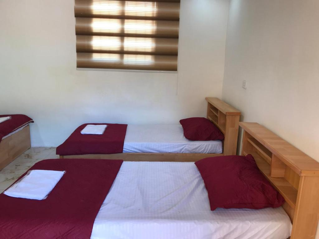 Postel nebo postele na pokoji v ubytování مزرعة سيلا خاصة للعائلات