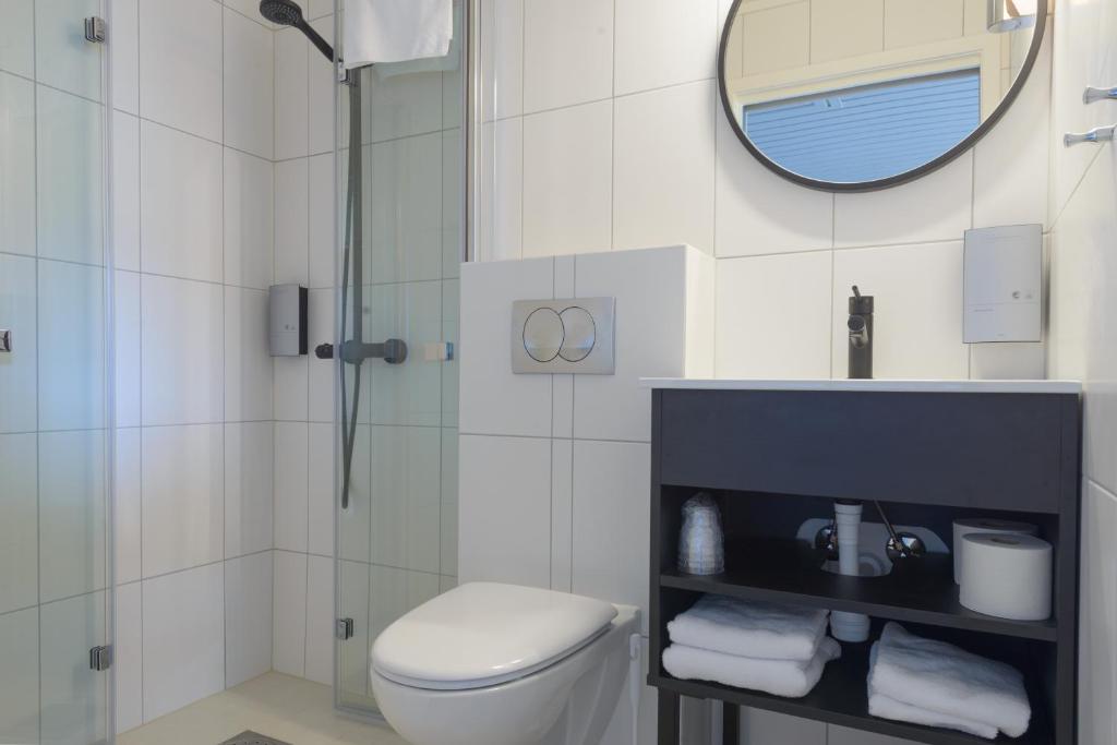 Koupelna v ubytování Grønnbuene Rorbu Hotel