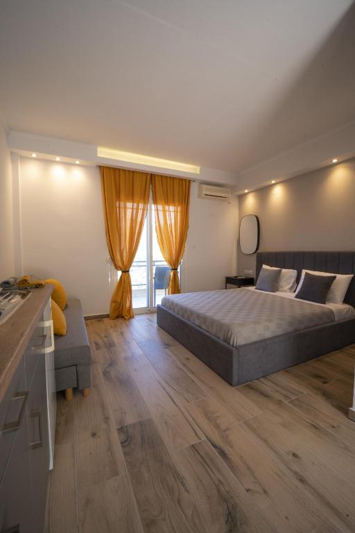 Postel nebo postele na pokoji v ubytování Golden View Studios
