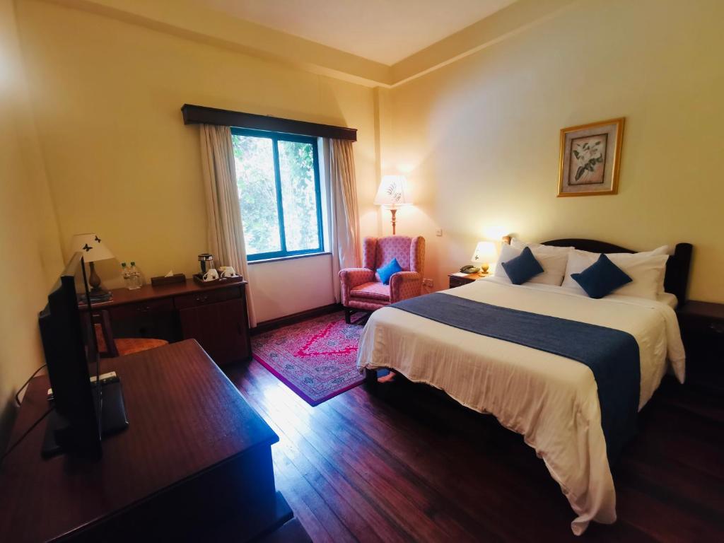 Postel nebo postele na pokoji v ubytování La Mada Hotel
