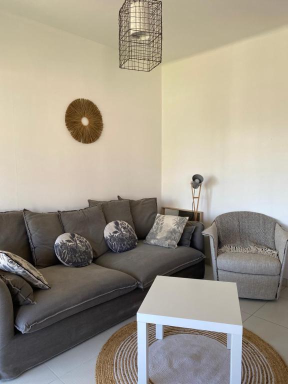 Posezení v ubytování Appart 2ème ligne vue mer, 2 chambres, clim, internet, parking